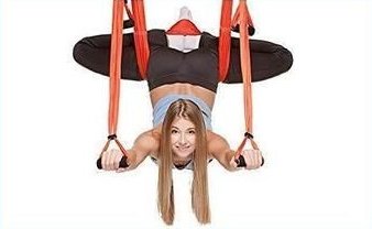 What is Aerial Yoga? Benefits, Best Poses and more (2023)